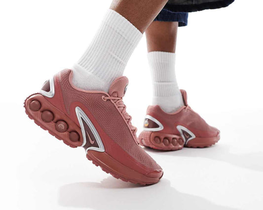 Nike Air Max DN trainers in pink and silver