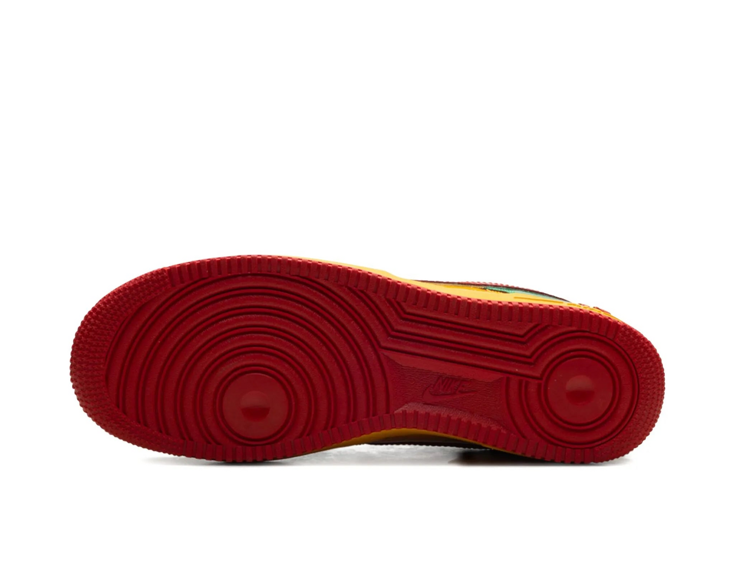 Red sole of a shoe on a white background