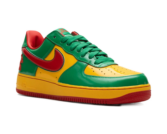 Colorful sneaker with green, yellow, and red design on a white background