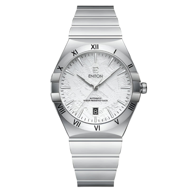 Silver watch with a detailed face on a black background