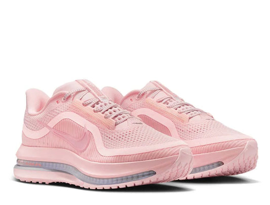 Pair of pink running shoes on a white background