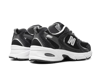 New Balance 530 ‘Classic Black/Grey’ Sneakers – Timeless Street Performance | Luxem Swiss