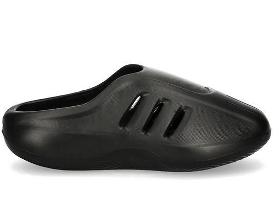 Black slip-on shoe with ventilation holes on a white background