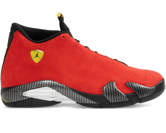 Red athletic shoe with black and yellow accents on a white background