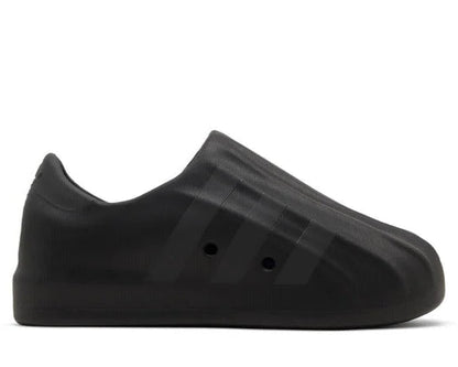 Black slip-on shoe on a white background