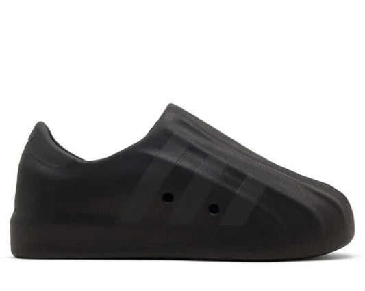 Black slip-on shoe on a white background