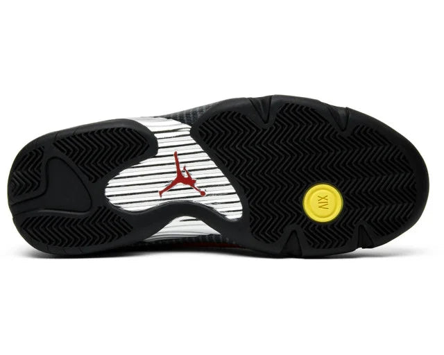 Black and white sneaker with red logo and yellow Nike circle on sole